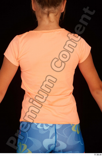 Esme dressed sports t shirt upper body 0006.jpg